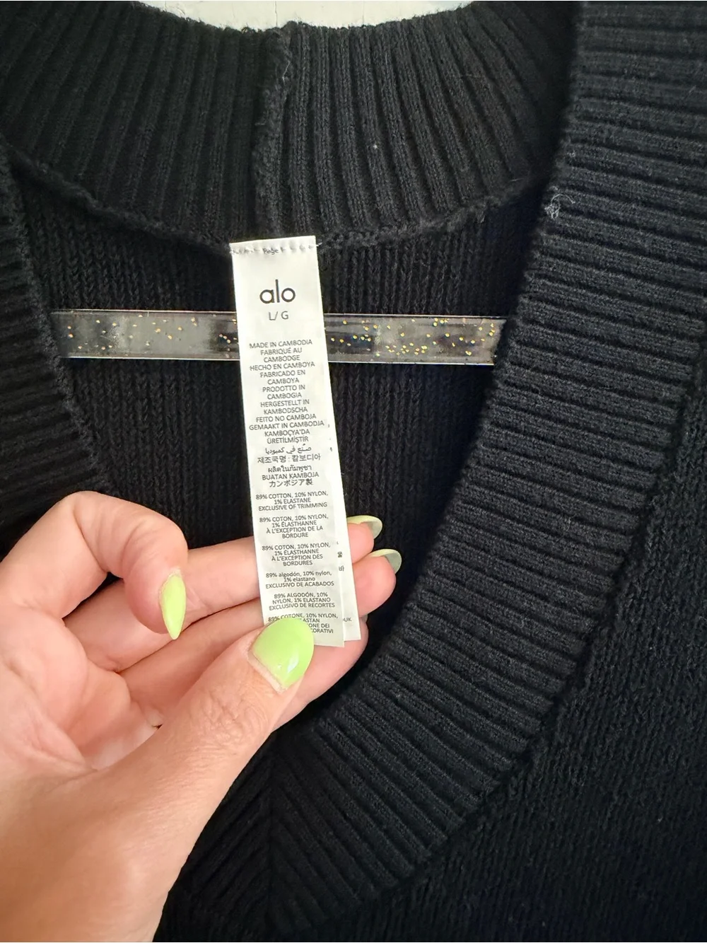 ALO Yoga Black Cropped V‑Neck Knit Vest